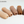 Set of five silicone sleeves in different tones on a white background